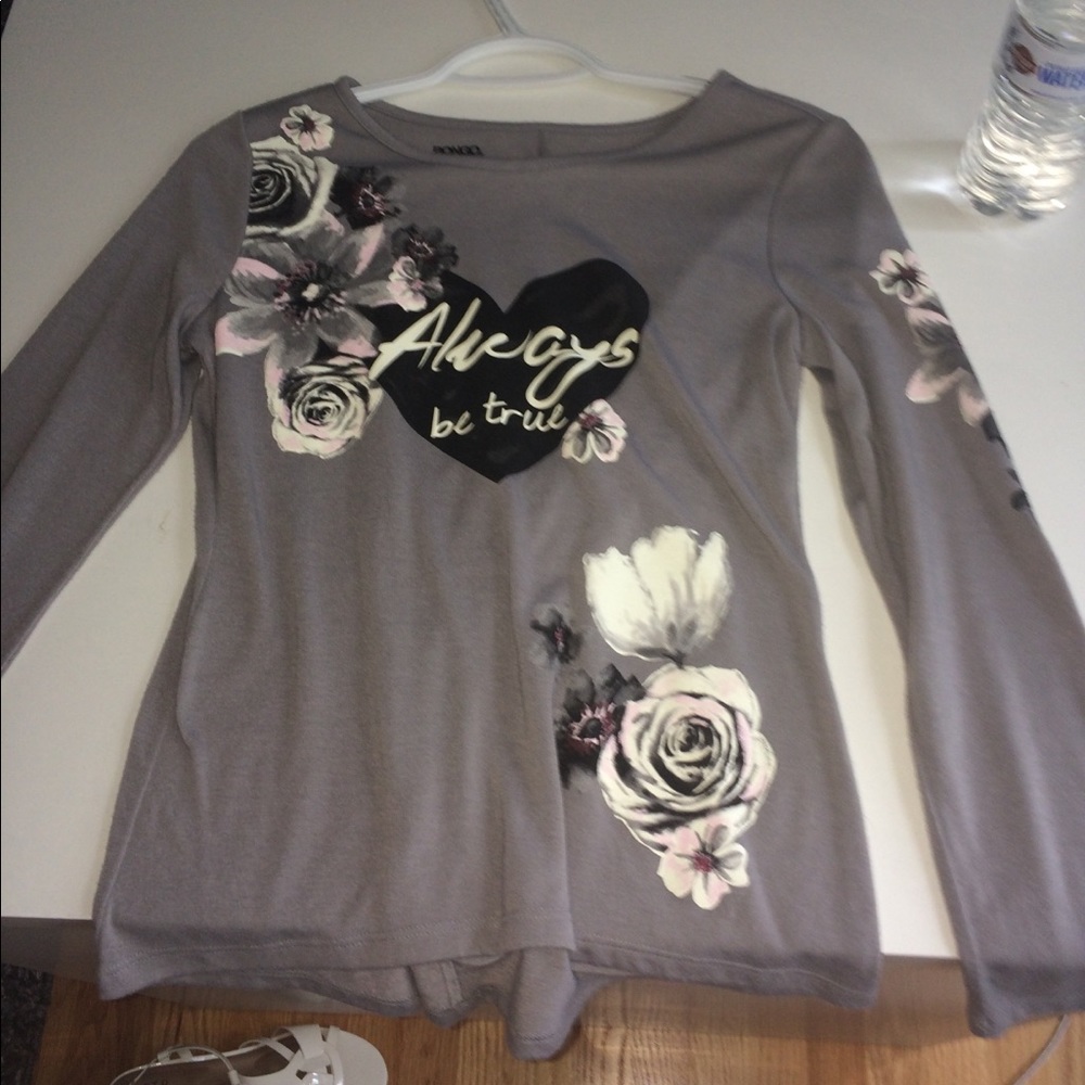 A grey long sleeve for kids